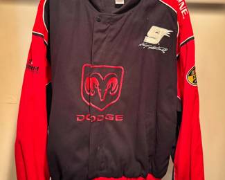 This is a vintage 2006 Kasey Kahne #9 Dodge Ram NASCAR racing jacket by Winners Circle featuring embroidered sponsor logos and a snap-front design.