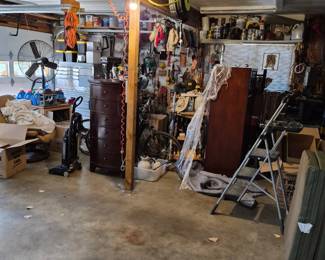 The garage is brimmed ULTRA MAX! It looks disorganized but we are gearing it up for you. Sooooo much to see and buy at this sale.