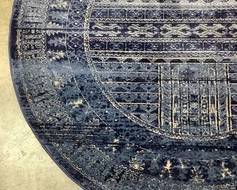 blue traditional round rug