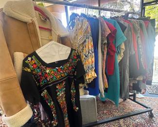 Racks of great clothing! Mens and womens~ some with tags still on. Vintage, designer, couture