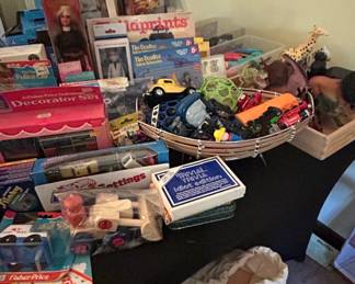 Vintage Toy Assortment Lot with Corgi Yellow Submarine, FisherPrice Decorator Set, and Care Bears Funshine Bear