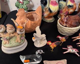 chicken and bird figurines and planters and nesting hens