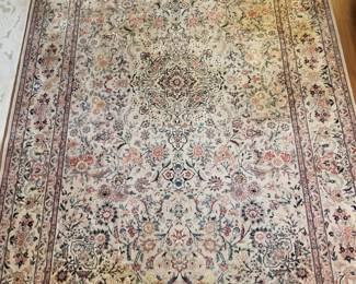 Silk and wool blend handcrafted Persian area rug