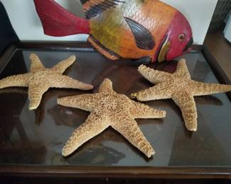 Painted wood fish with star fish.