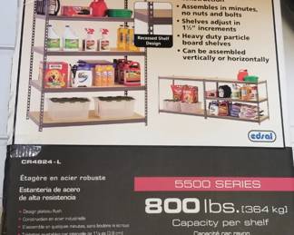 Two Muscle Rack shelving units, original boxes.
