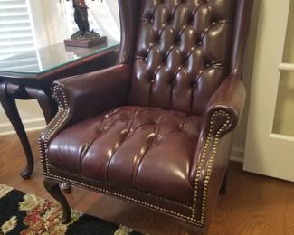 Faux leather Queen Anne tufted wingback chair
