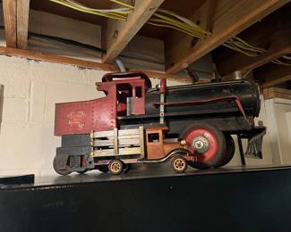Keystone sit on toy train
