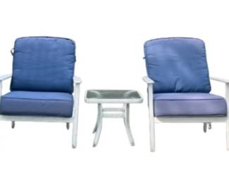 Two White Aluminum Outdoor Chairs With Blue Seats And Table