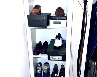 A large collection of men's shoes, ties and clothes