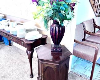 Vintage side table with large floral arrangement