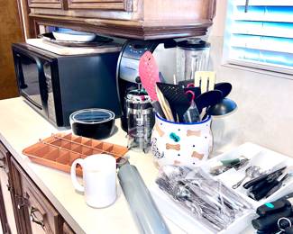 Lots of kitchen, accessories, and utensils