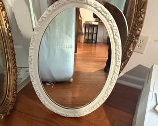 Ornate White Oval Wall Mirror with Scrolled Frame
