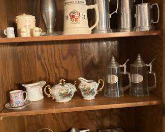 Pewter vase, steins, brass trays