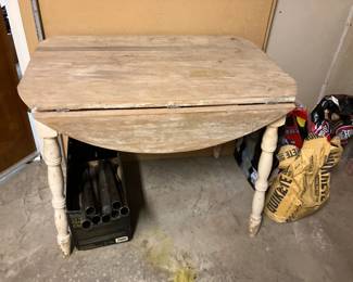 Dropleaf table stripped of paint