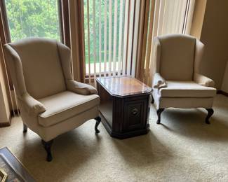 Wingback chairs w cream upholstery