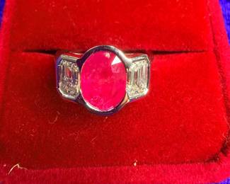 Large, ruby and diamond ring