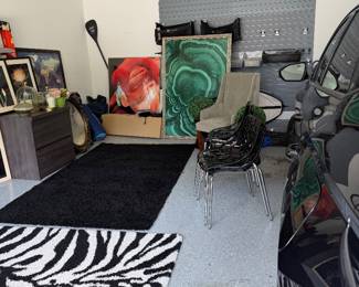 Multitude of art and rugs