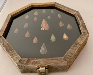 17 Arrowheads in barnwood shadowbox $75.