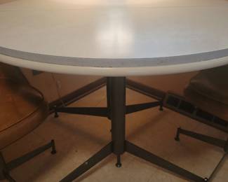 Table and rolling chairs