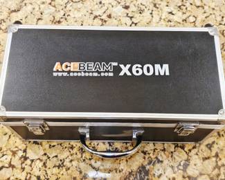 Acebeam 10,000 Lumen x60m flashlight works great comes with case
