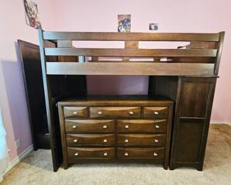 Wood full size loft bed with built-in dresser on one end and stairs on the other end, matching wooden dresser sold separately