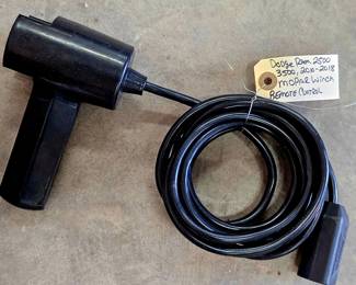 pistol-grip handheld winch remote control with a long black cable and a plug connector... fits 2010–2018 Dodge Ram 2500/3500 Mopar winches