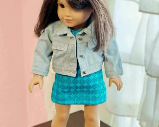 American Girl doll sold with current pictured clothing