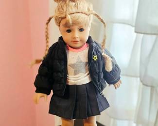 American Girl doll sold with current pictured clothing