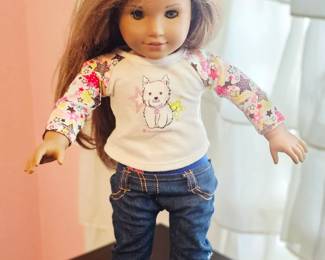 American Girl doll sold with current pictured clothing
