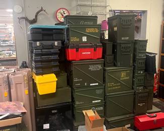 huge piles of ammo cans various sizes, also cash tubes