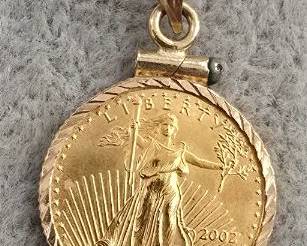 Gold Walking Liberty Medalion