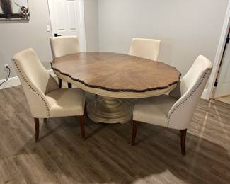 Oval wood pedestal table, upholstered nailhead chairs