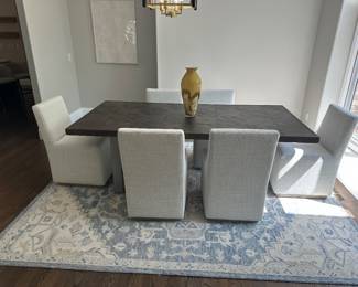 Dining table with metal base with six parsons style chairs, 8x10 area rug by Ralph Lauren