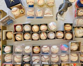 Over 50 autographed baseballs by HOFamers, US Presidents & Celebrities.