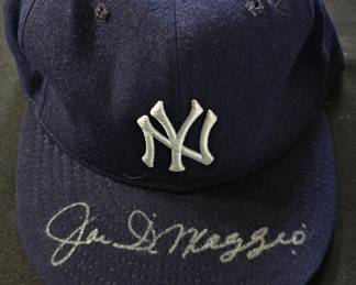 Autographed NY Yankees cap by HOF Joe Dimaggio.