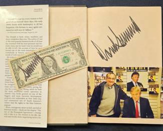 President Trump autographed book, dollar bill & baseball.