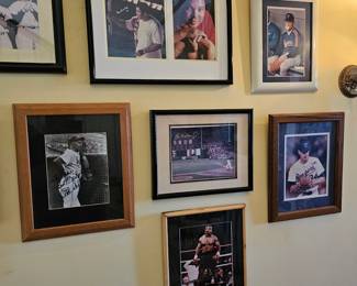 Numerous autographed photos by the likes of Ali, Ripken Jr., Nolan Ryan & MORE !