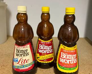 Three Mrs. Butterworths Syrup Bottles