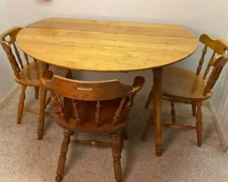 Round Drop Leaf Table with Three Chairs