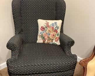 Wing chair has matching footstool