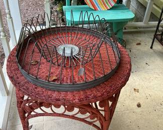 How cool is this piece on top of the wicker table! It is a vintage plate rack from an early model dishwasher. Not real sure how old it is.