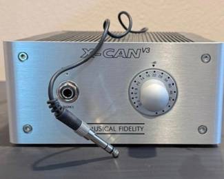 $200 -   Musical Fidelity X-Can V3 - $200 One of the most respected headphone amplifiers of the early 2000s. Introduced in 2003, it uses a hybrid design that combines vacuum tubes in the input stage with a solid-state output stage, giving it much of the warmth of tube gear while retaining the current delivery and control of a transistor amplifier. 