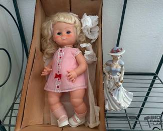 1602 Vogue Doll and Porcelain Figurine Music Box