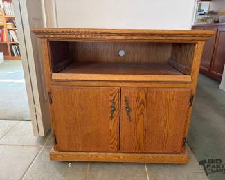 1002 Entertainment Cabinet With VHS and Cassette Tapes