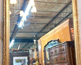 Large ornate gold frame mirror