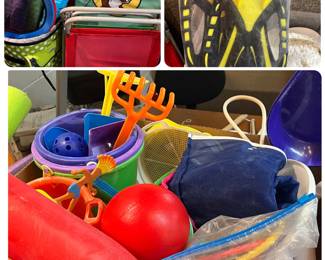 Lot of beach toys, wake boards, beach ball, snorkeling fins and more