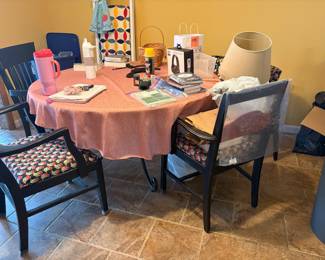 Round kitchen table with four chairs