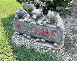 Concrete welcome sign with bears