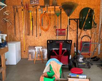 Juan and gardening tools, wheelbarrows