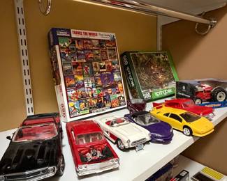 Collection of Diecast Model Cars and Jigsaw Puzzles